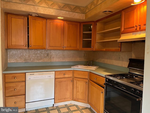 kitchen with sink, dishwasher, backsplash, range with gas stovetop, and exhaust hood