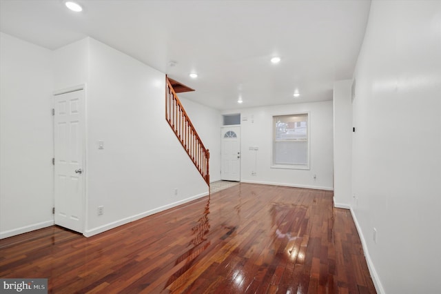 foyer entrance with wood-type flooring