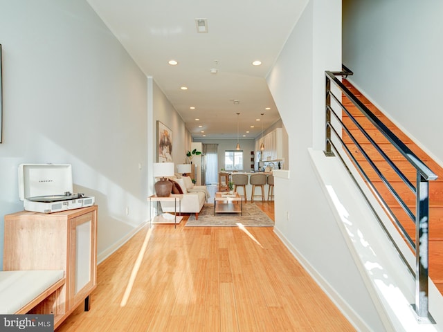 hallway featuring wood-type flooring