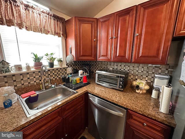 kitchen featuring tasteful backsplash, dishwasher, sink, and stone counters