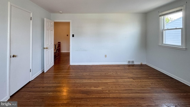 interior space featuring dark wood-type flooring