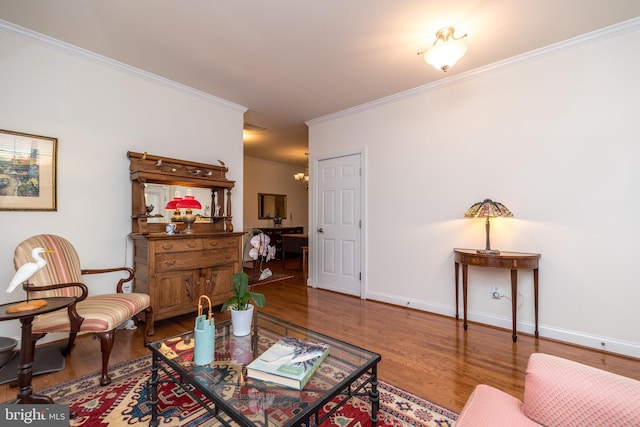 living room with crown molding and wood-type flooring