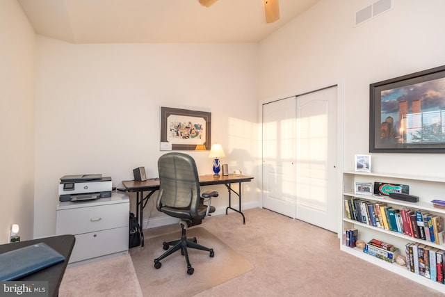 home office with light colored carpet and ceiling fan