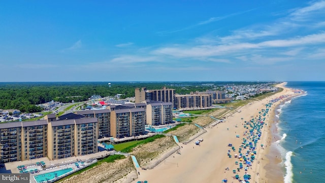 bird's eye view with a view of the beach and a water view