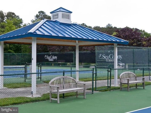 view of community with a gazebo and tennis court