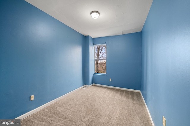 view of carpeted spare room