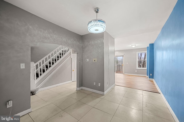 interior space featuring light tile patterned flooring