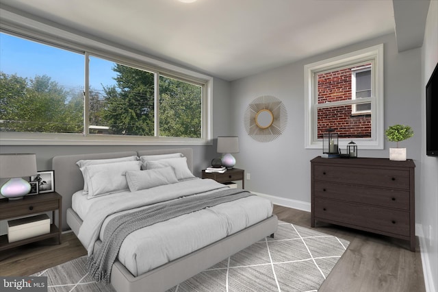 bedroom with light hardwood / wood-style floors