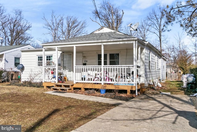 bungalow-style house featuring covered porch