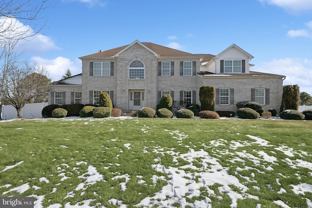 colonial house with a lawn