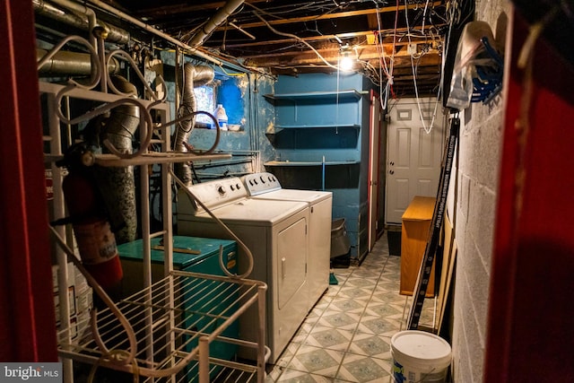 washroom featuring independent washer and dryer