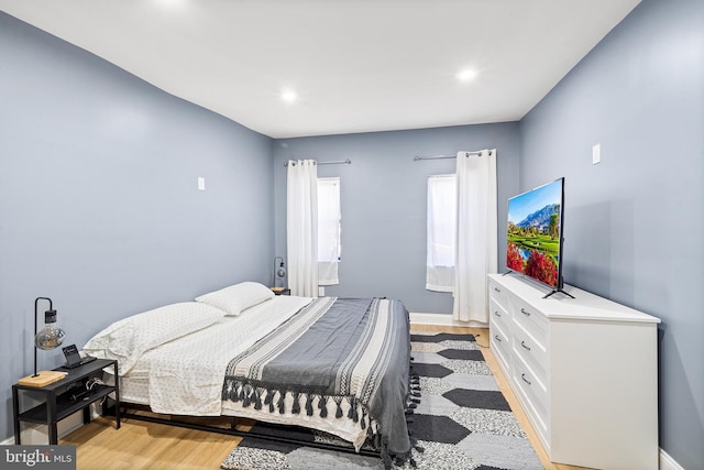 bedroom featuring light wood-type flooring