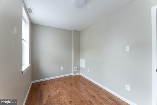 empty room featuring wood-type flooring