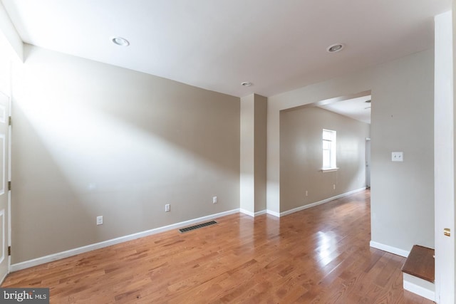 empty room with wood-type flooring