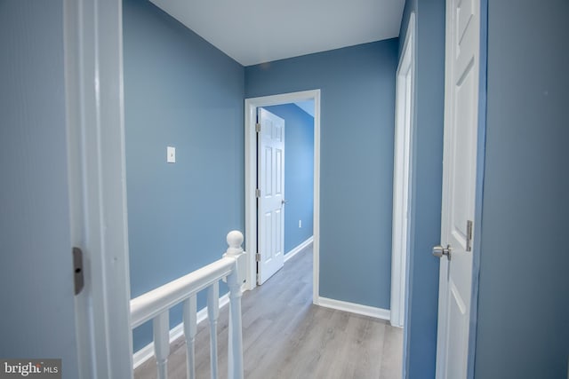 corridor featuring light wood-type flooring