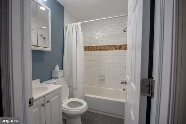 full bathroom with shower / bath combination with curtain, vanity, and toilet