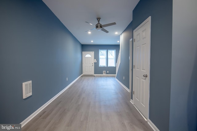 interior space featuring light hardwood / wood-style floors and ceiling fan