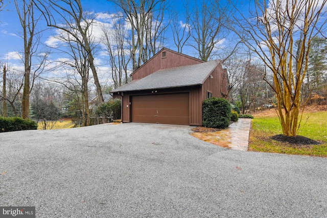 garage featuring driveway