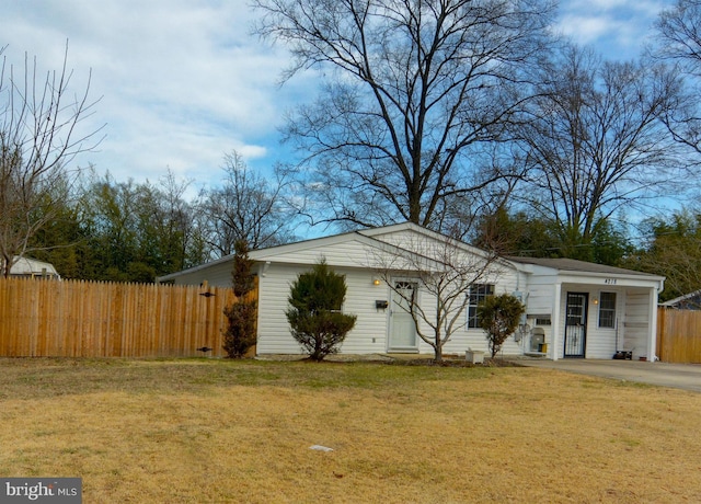 ranch-style home with a front yard