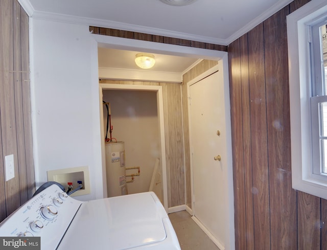 laundry room featuring wooden walls, ornamental molding, washer / clothes dryer, and water heater