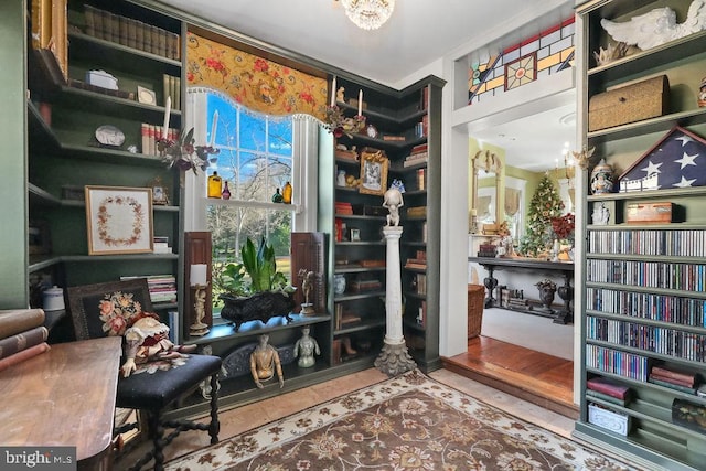 sitting room featuring a notable chandelier