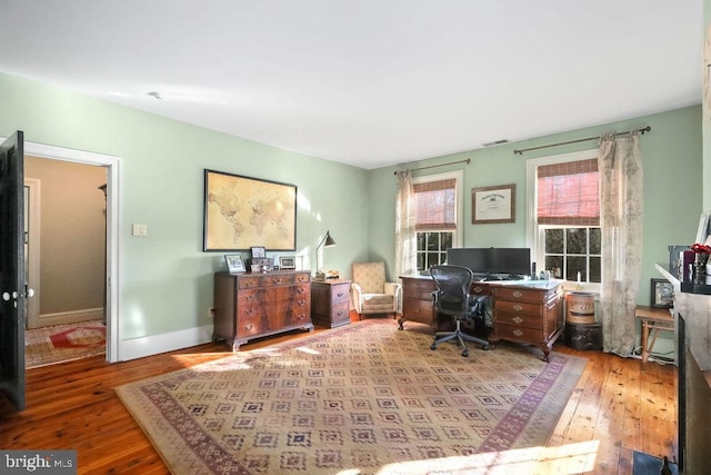 office space featuring light hardwood / wood-style floors