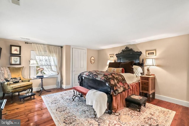 bedroom featuring wood-type flooring