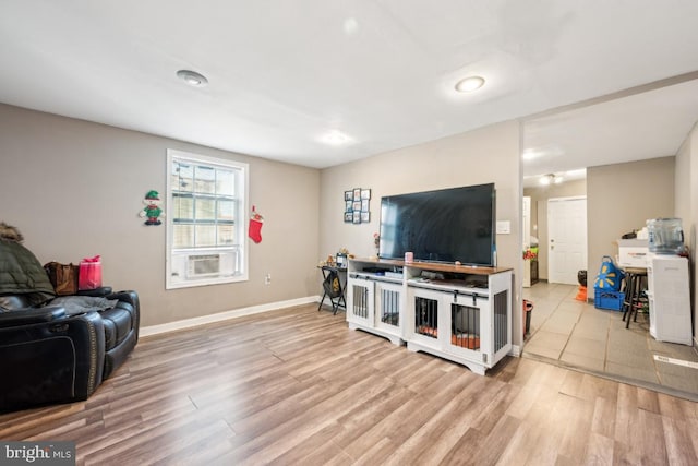 living room with light hardwood / wood-style floors