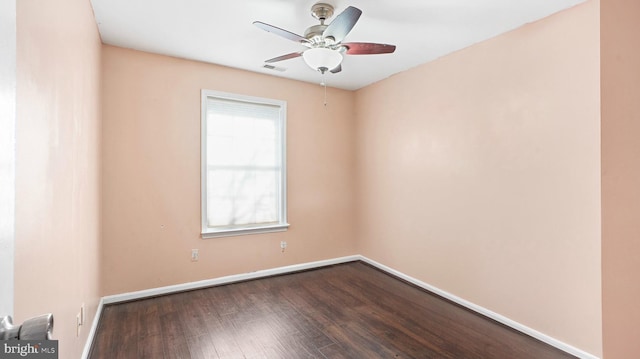 unfurnished room featuring ceiling fan and wood-type flooring