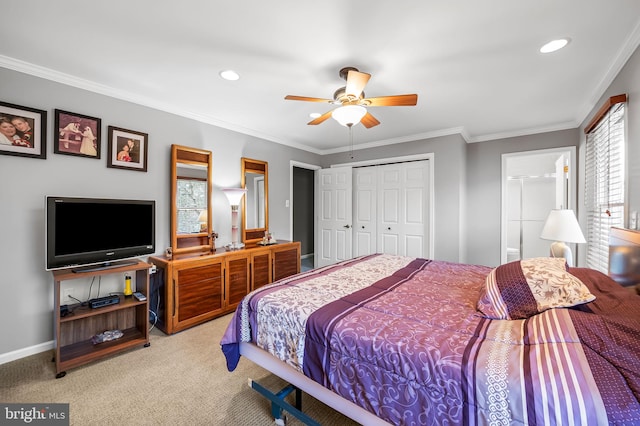 bedroom featuring crown molding, carpet floors, ceiling fan, and a closet