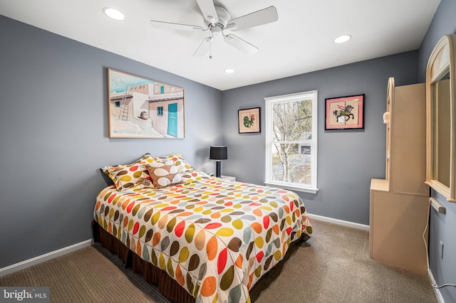 carpeted bedroom featuring ceiling fan