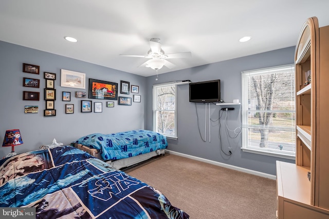 bedroom with ceiling fan and carpet