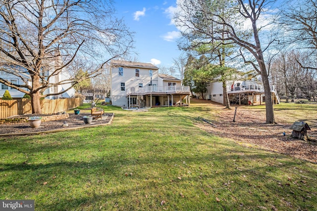 view of yard featuring a wooden deck