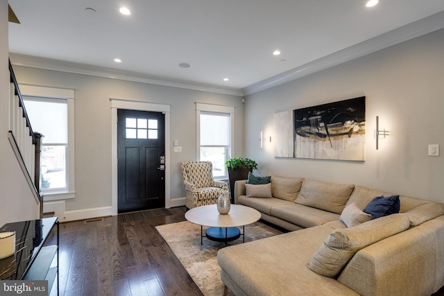 living room with recessed lighting, baseboards, stairs, ornamental molding, and dark wood-style floors