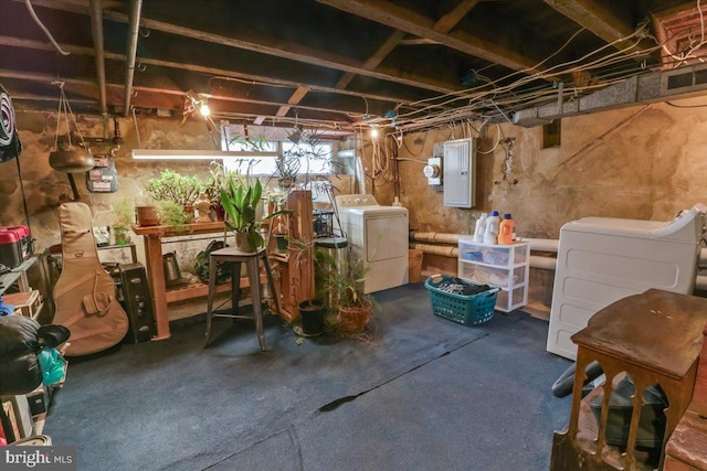 basement with washing machine and dryer