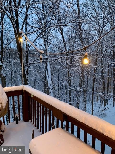 view of snow covered deck