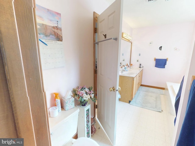 full bath with vanity and tile patterned floors