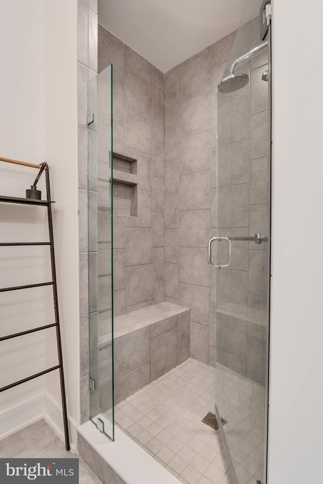 bathroom with a stall shower