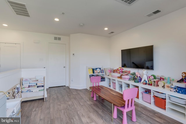 game room featuring visible vents, wood finished floors, and recessed lighting