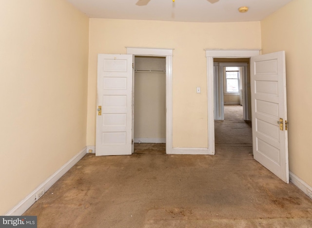 unfurnished bedroom featuring a closet and carpet