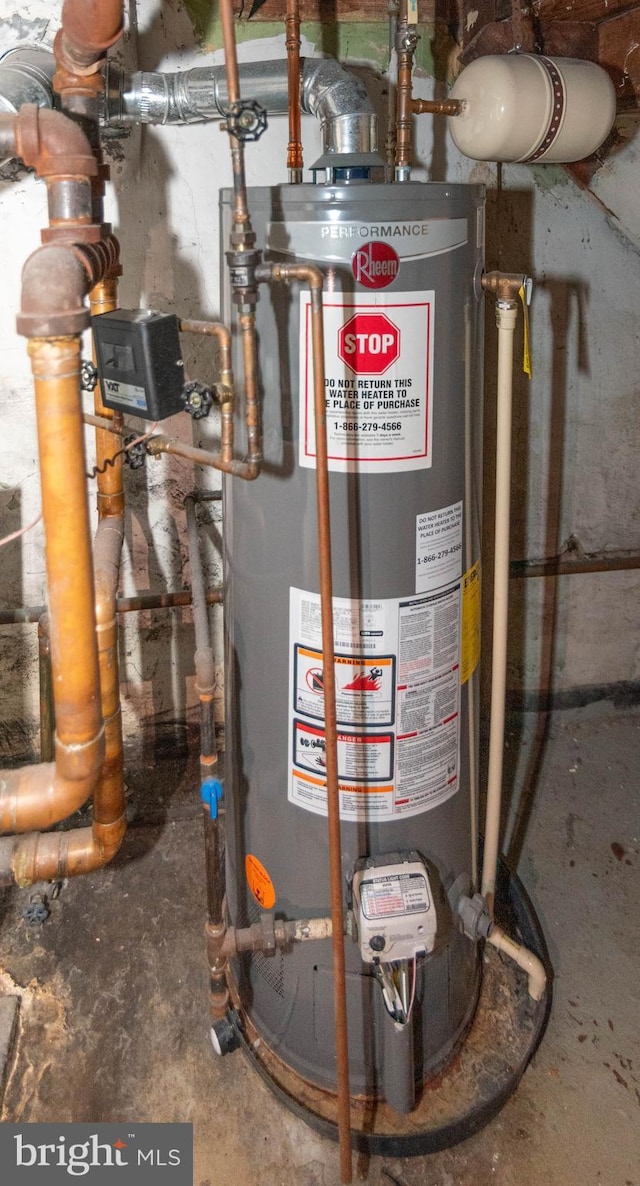 utility room with water heater