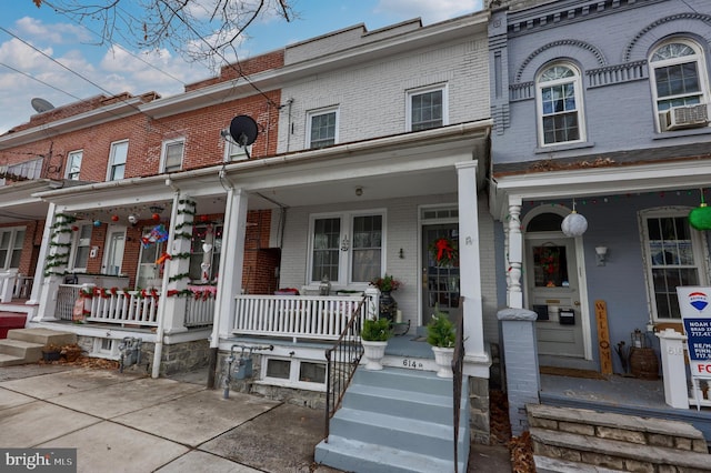 multi unit property featuring covered porch