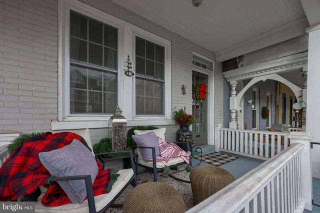 wooden terrace featuring a porch