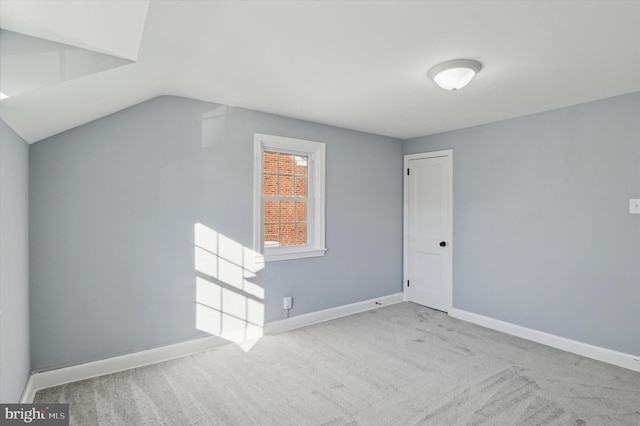 interior space featuring vaulted ceiling