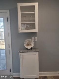 interior space featuring white cabinets