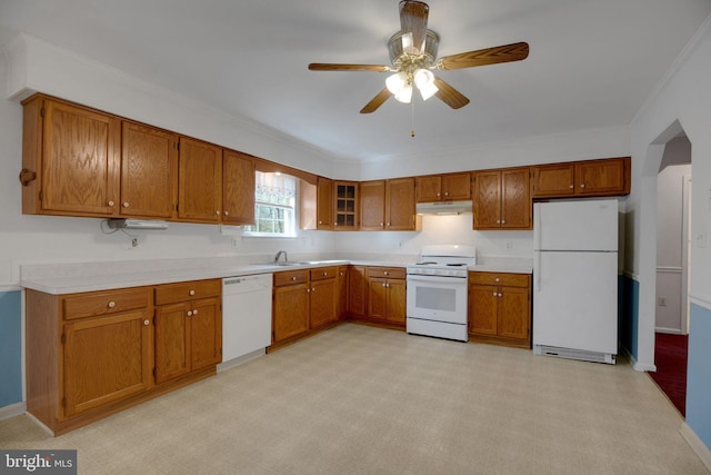 kitchen featuring crown molding, sink, ceiling fan, and white appliances