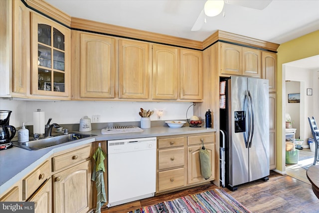 kitchen featuring sink, hardwood / wood-style flooring, stainless steel fridge, dishwasher, and light brown cabinetry