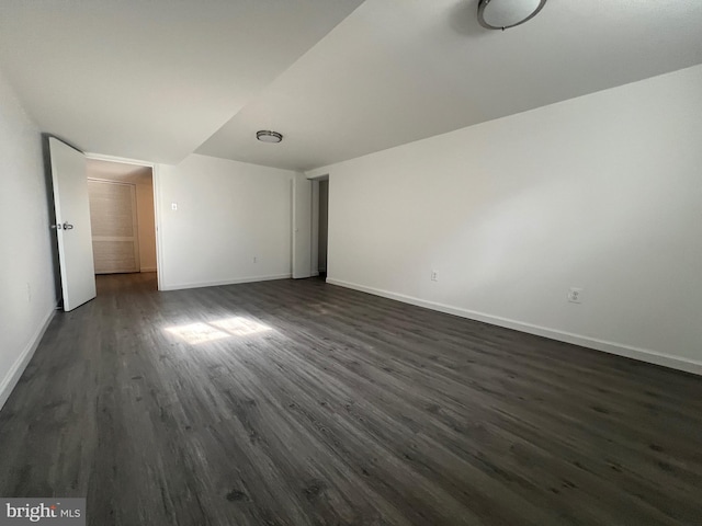 unfurnished bedroom featuring dark wood-type flooring