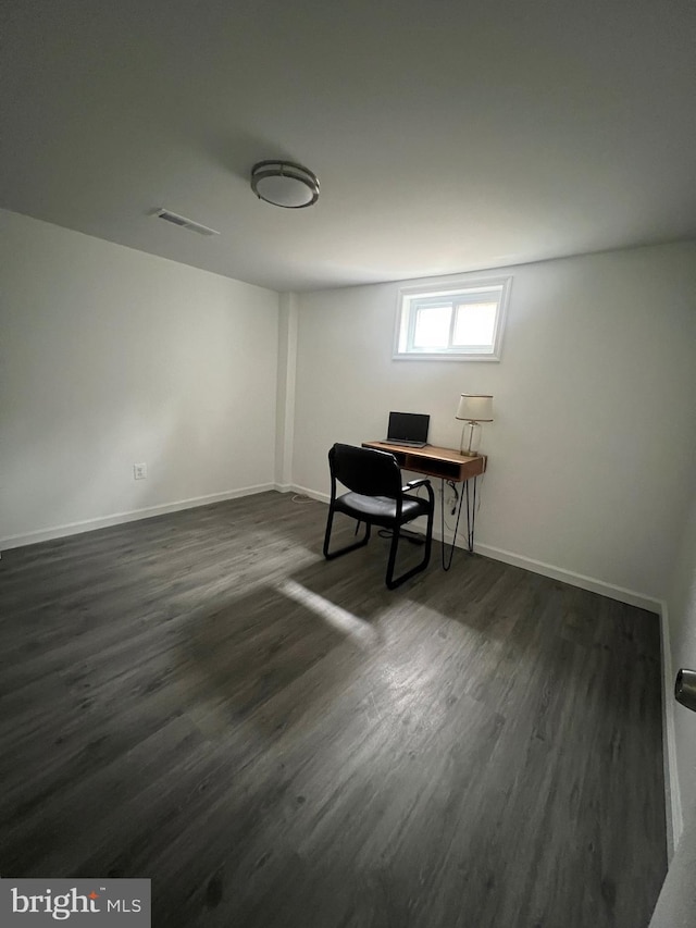 office space featuring dark hardwood / wood-style floors