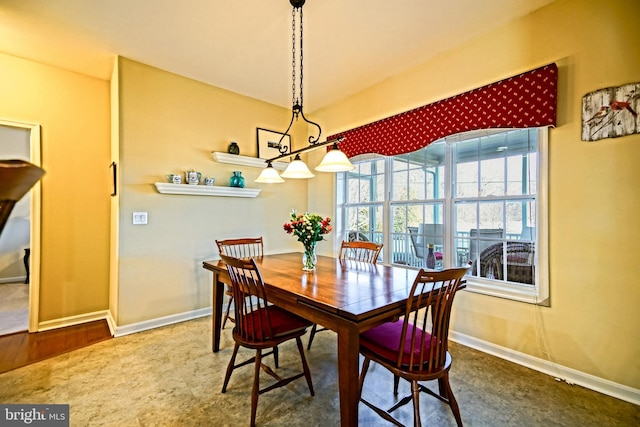 dining space with baseboards